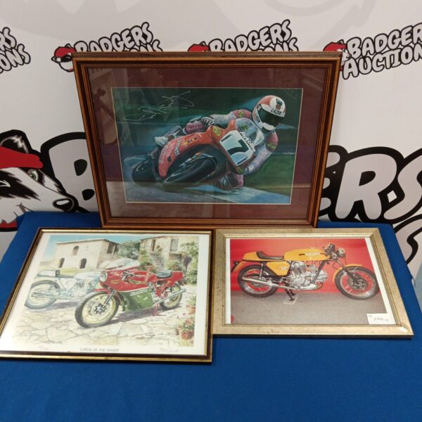 Framed Ducati motorcycle print signed by Carl Fogarty.