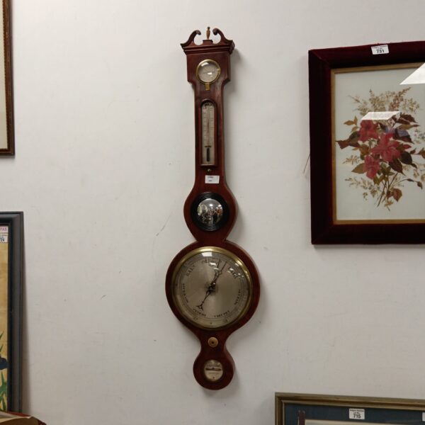 Vintage Lombardini Bristol wall barometer in a wooden frame.