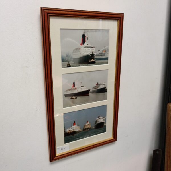 Framed set of vintage photographs featuring the Queen Elizabeth and Queen Mary ships.