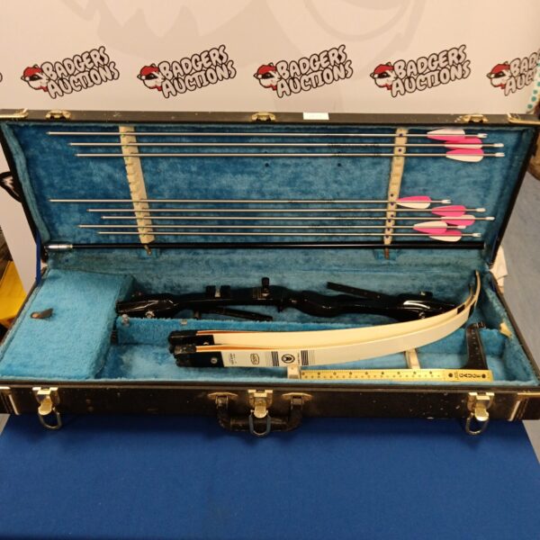 Vintage Kestrel take down bow in open case with arrows.