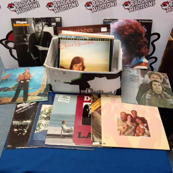 Vinyl record lot including Simon & Garfunkel LPs, vintage music collection.