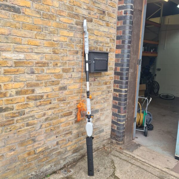 Long reach Vonhaus hedge cutter for garden maintenance.