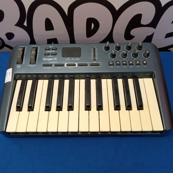Compact Oxygen 25 MIDI keyboard for music production and DAW control.