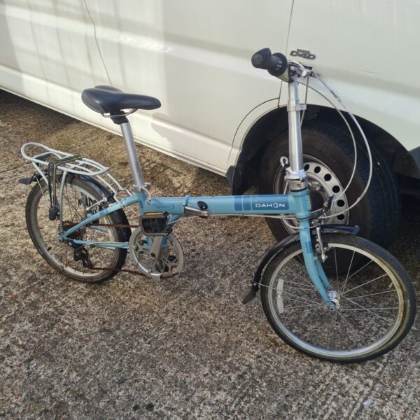 Blue Dahon Speed folding bicycle, ideal for compact travel and commuting.
