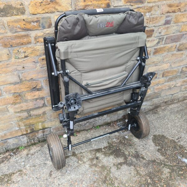 Used Pegone transformer fishing chair with side tray.