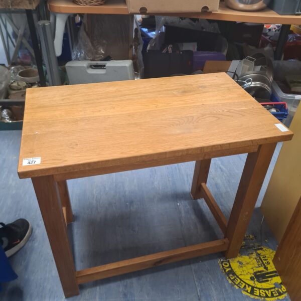 Rustic solid oak side table with farmhouse style.