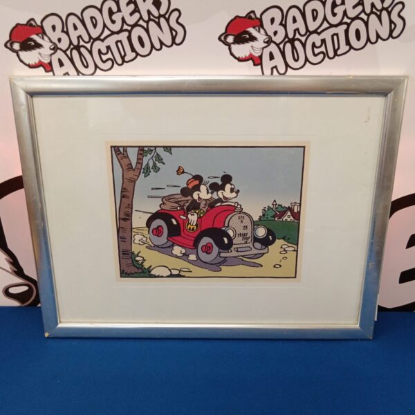 Vintage framed print of Mickey and Minnie Mouse in a car.