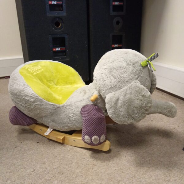 Grey Gerrardos elephant rocker with yellow ears.