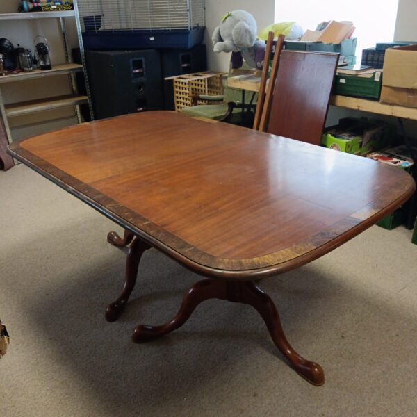 Brights of Nettlebed extending dining table in a room setting.