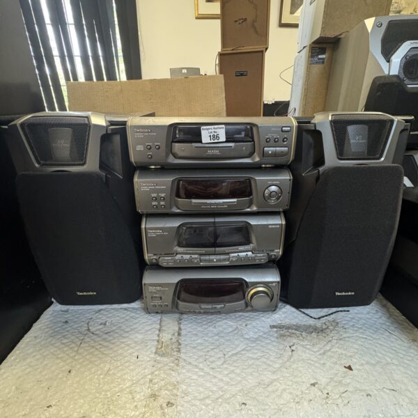 Vintage Technics SC-CA300 hi-fi system with components stacked.