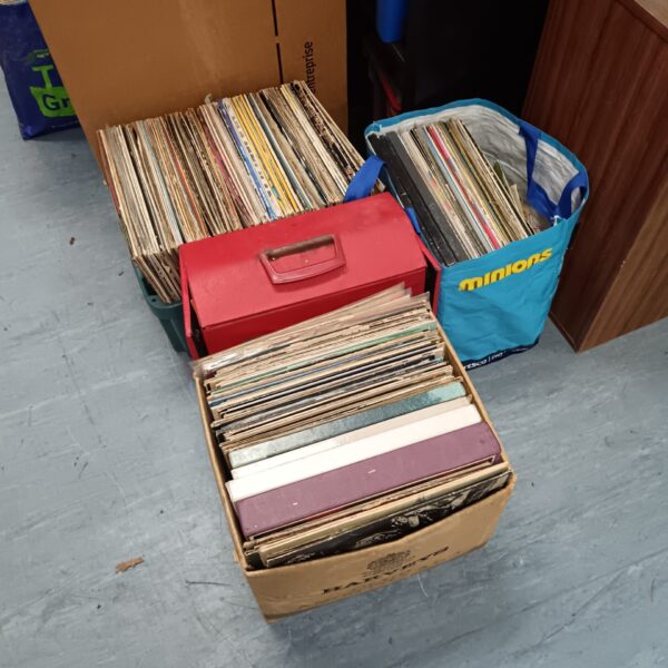 Large lot of vintage vinyl records in storage.