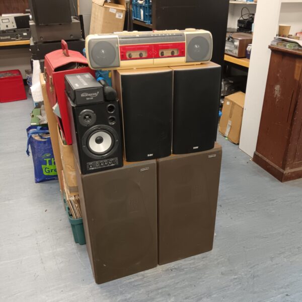 Lot of speakers for repair, including Behringer and B&W models.