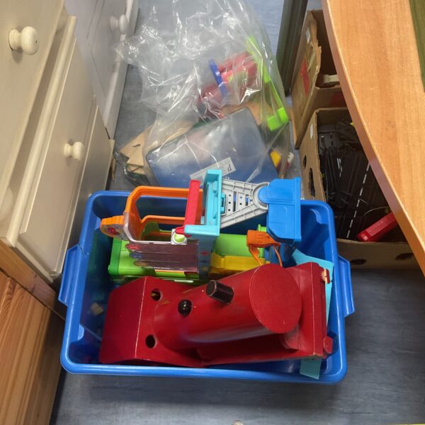 Mixed lot of vintage and modern children's toys with a wooden train.