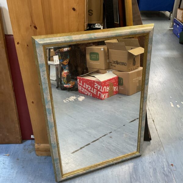 Elegant gilt framed mirror measuring 85x59cm for home decor.