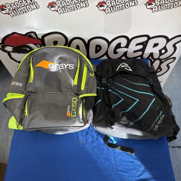 Two hockey kit bags, a Grays GX150 and a Dragon bag, in used condition.