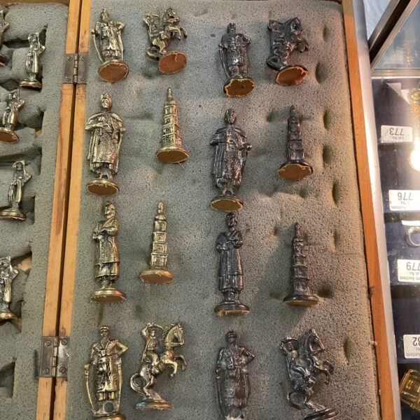 Vintage Indian chess set in wooden case, brass and bronze pieces.