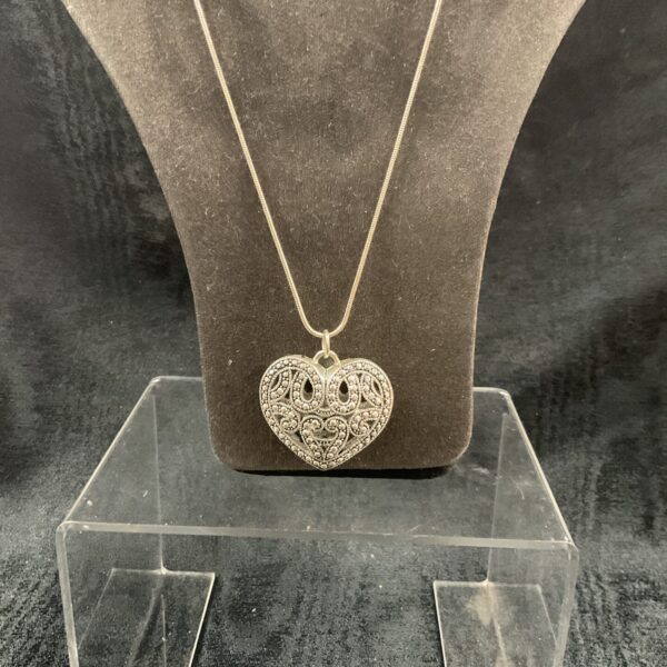 Vintage silver-tone necklace with marcasite heart pendant.