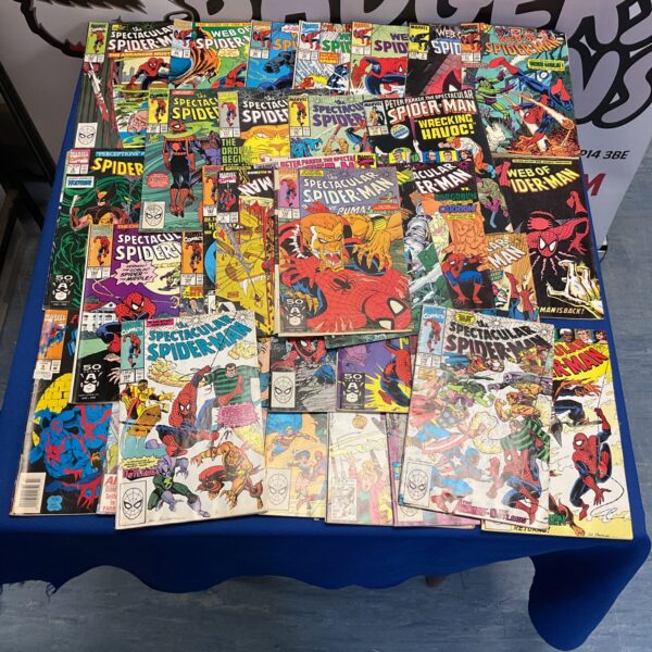 Vintage Spiderman comics lot featuring classic Marvel characters.