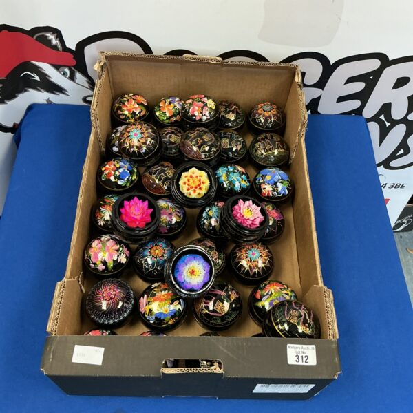 Vintage wax flower boxes with hand-painted floral designs.