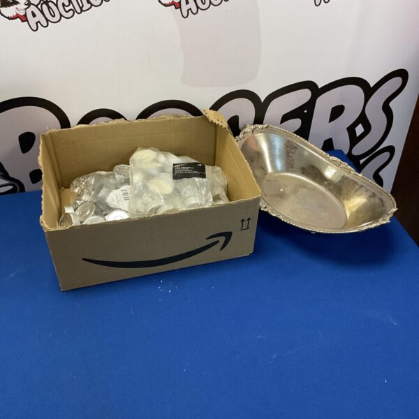Box of George Home tea lights and silver plate dish for home decor.