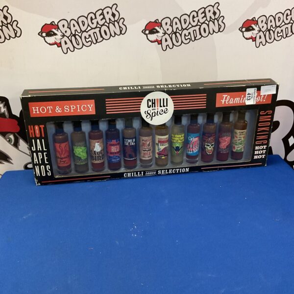 Colourful chilli sauce selection with various brands and flavours.