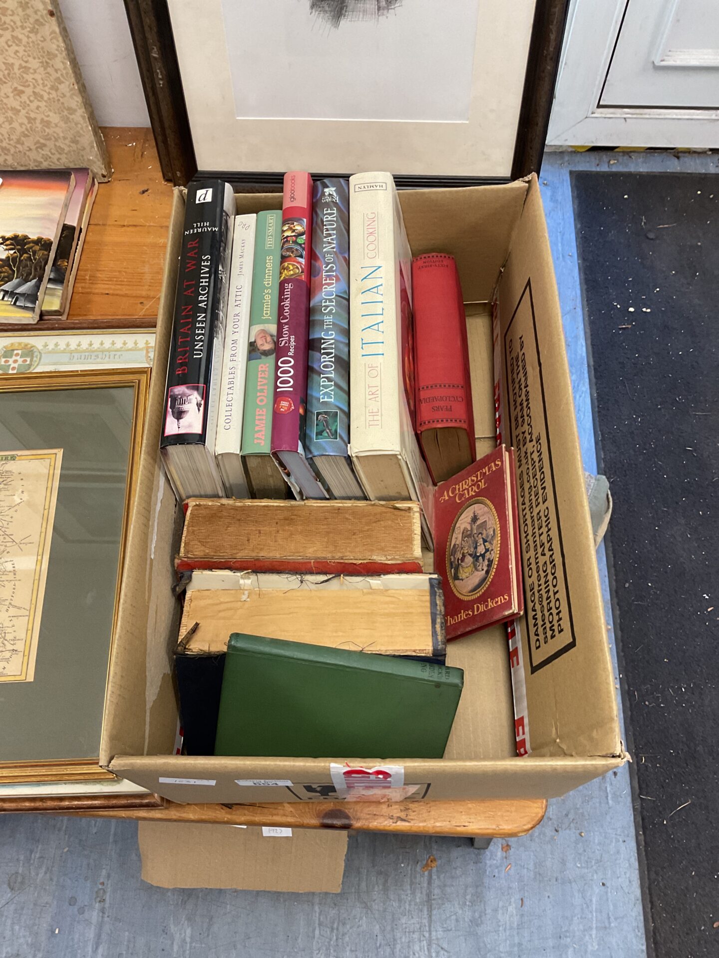 654 Box of books including cook books & charles dickins