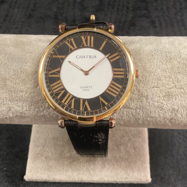 Gold-tone ladies fashion wristwatch with a large digital display.