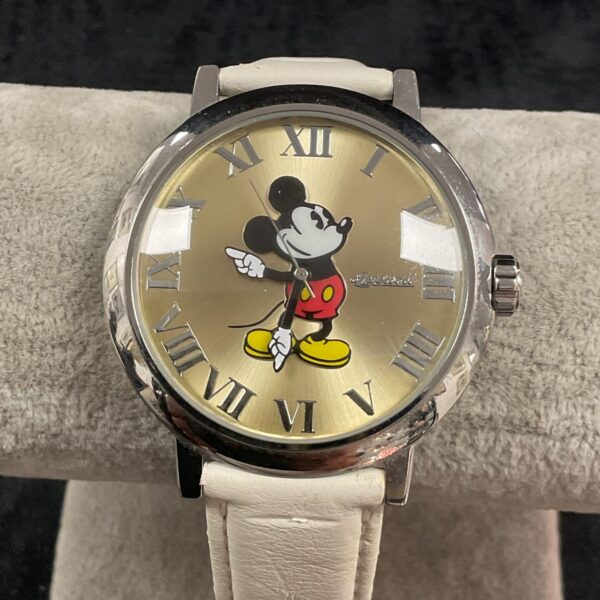 Vintage Ingersoll Disney Mickey Mouse watch with white strap.