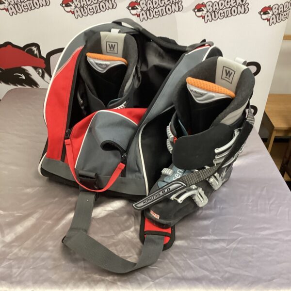 Salomon anatomic ski boots size 9, showing wear and tear.