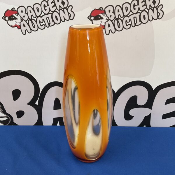 Vibrant orange art glass vase, mid-century modern style.