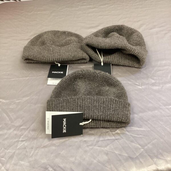 New Mackie beanie hat with tag, ideal for winter wear.