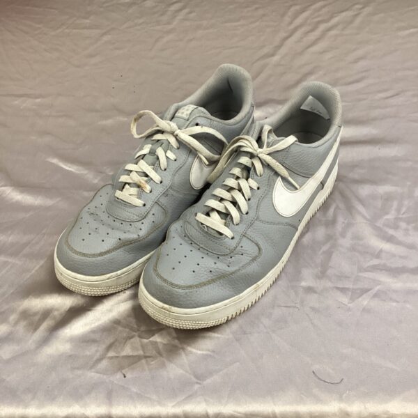Size 12 Nike Air Force 1 trainers, classic retro sneakers.