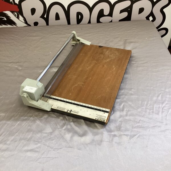 Vintage Myers paper cutter for precise paper trimming and office use.