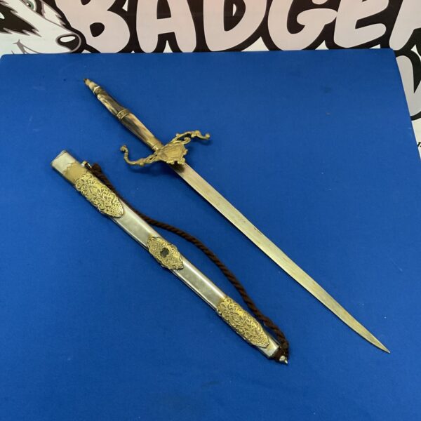 Vintage Indian sword with horn handle and curved blade.