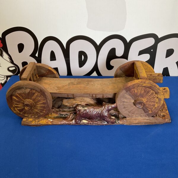 Vintage pottery train carriage with a sculpted hog detail.