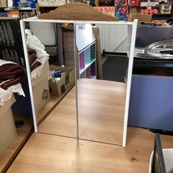 White mirrored bathroom cabinet for storage and vanity use.