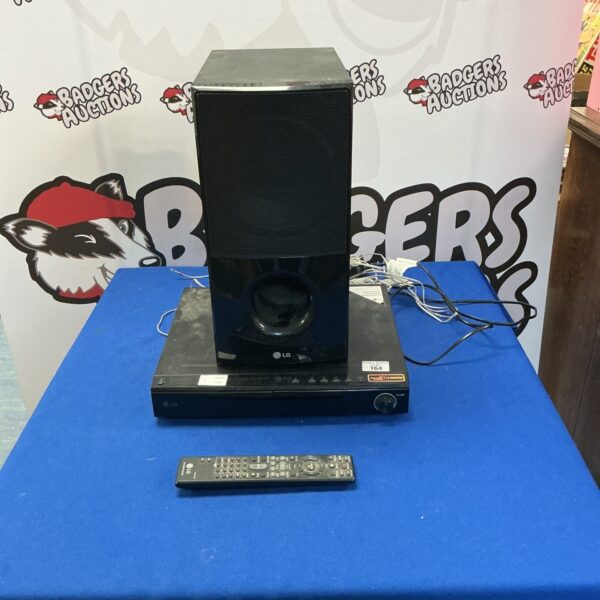 LG DVD home cinema system with speakers and remote control.