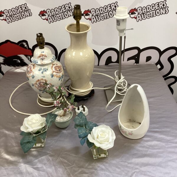 Vintage ceramic table lamp with floral design for home decor.