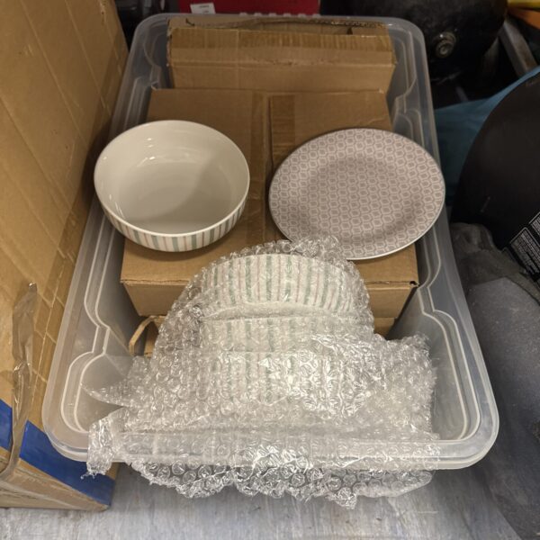 White porcelain dinner service set with bowls.