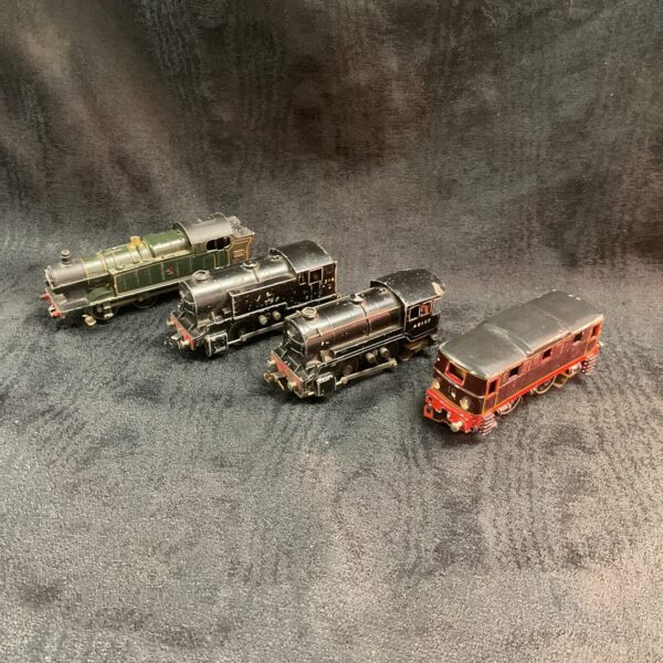 Vintage OO gauge train lot with four locomotives.