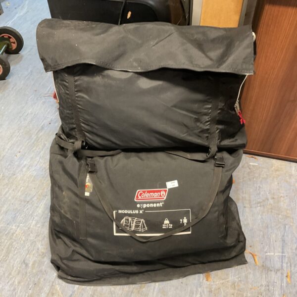 Used Coleman Exponent Modulus 7 man tent for family camping.