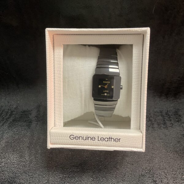 Stylish Rado ladies wristwatch with a ceramic bracelet and minimalist dial.