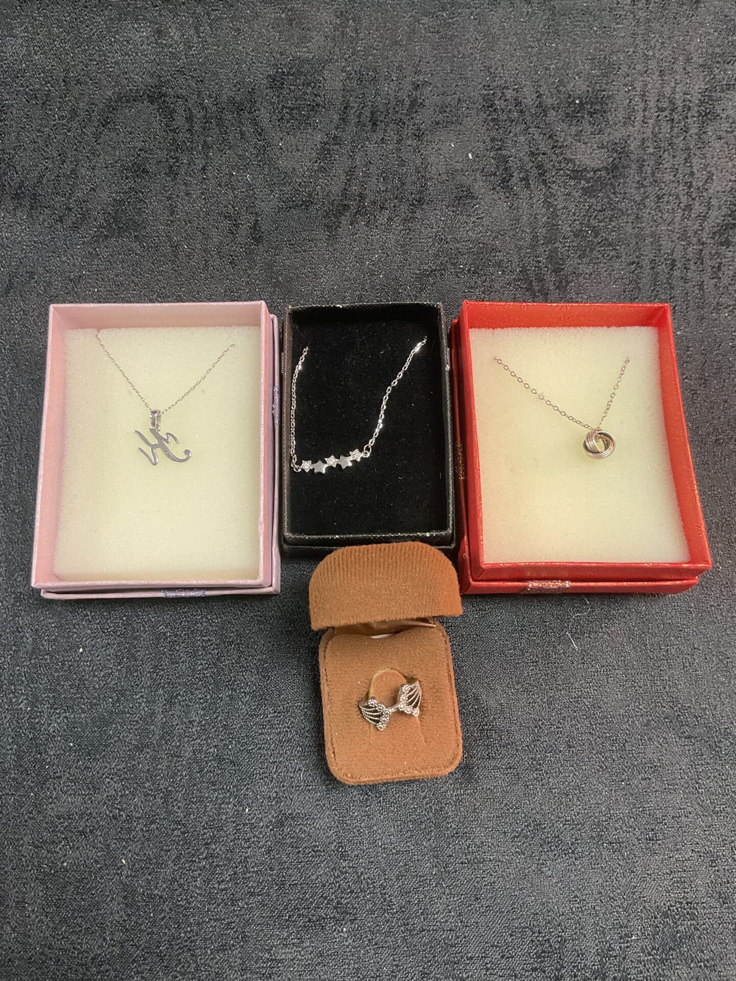 746 Three Silver pendant necklaces and a ring size j