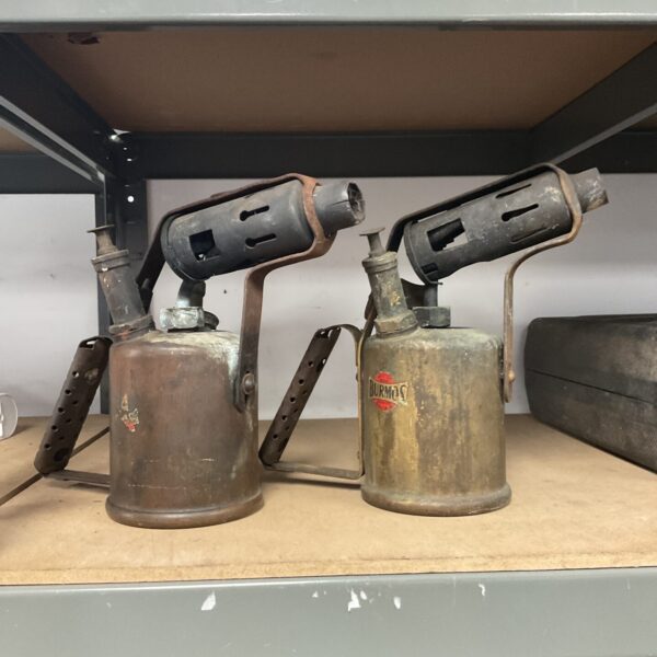 Pair of vintage blow torches, including a Burmos branded torch.