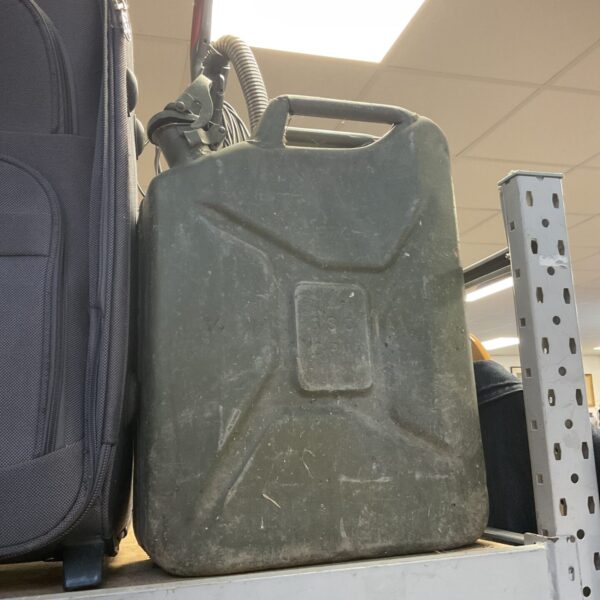 Vintage 1974 military jerry can, showing signs of wear.