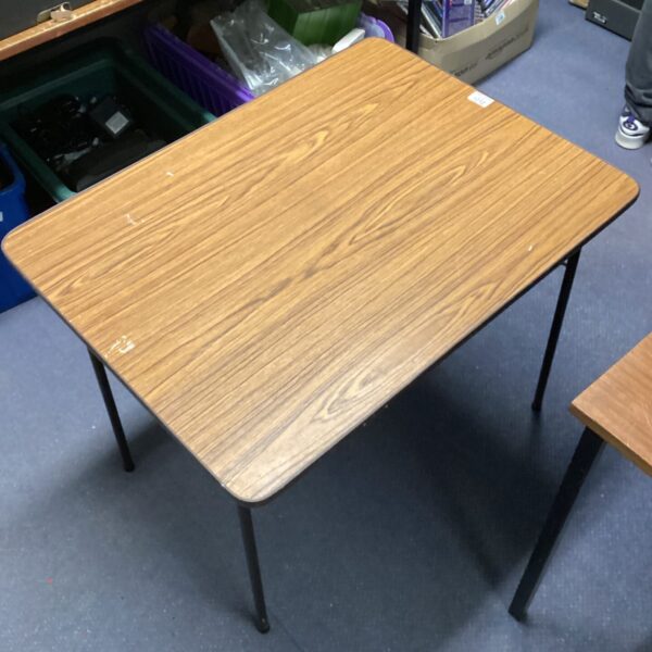 Vintage folding table with a Formica top in a retro style.