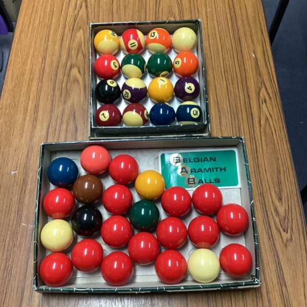 Aramith snooker and pool ball set displayed in a box.