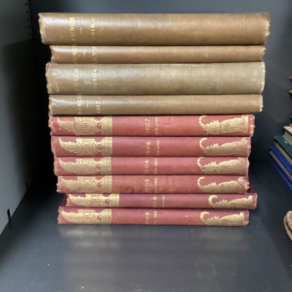 Collection of antique Punch annuals, Victorian illustrated magazines.
