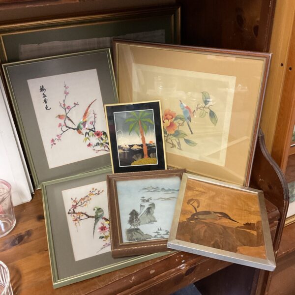 Antique oriental silk painting featuring vibrant birds and blossoms.
