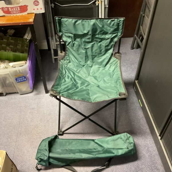 Blue folding camping chair, portable outdoor seating.